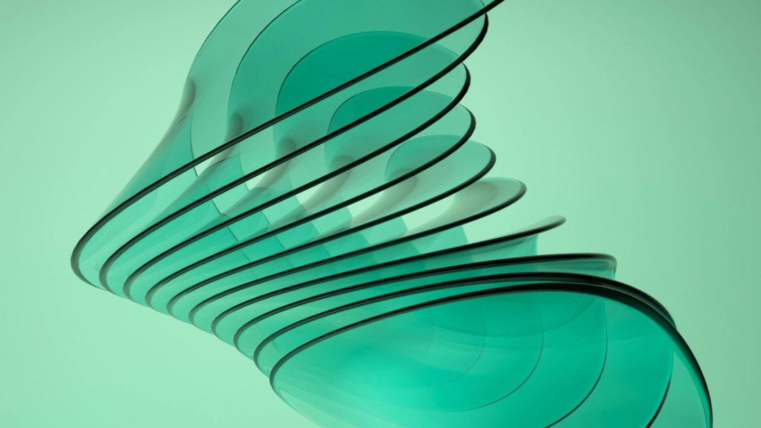 Abstract dark green spiral on a light green background