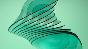 Abstract dark green spiral on a light green background