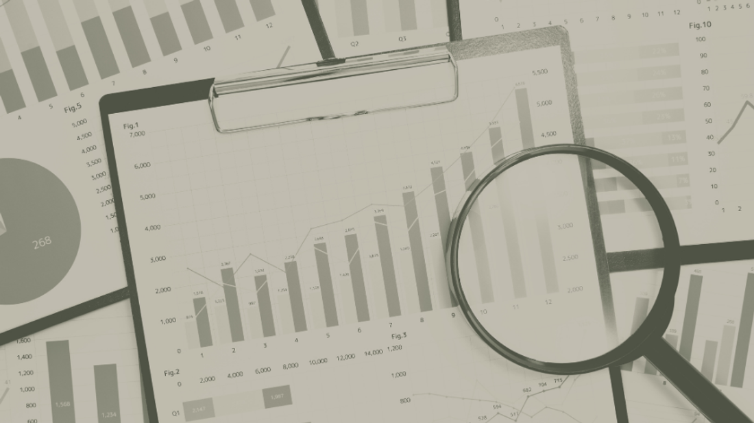 Businesswoman smiling next to an image of charts and graphs with a magnifying glass, symbolizing data analysis.