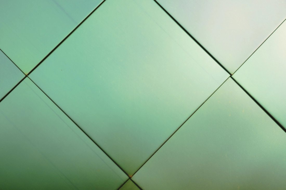 Series of light green metallic square tiles