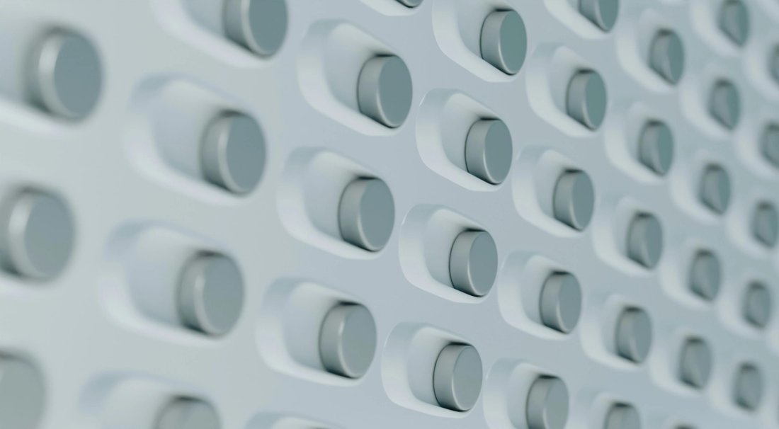 Rows of switches on a grey background.