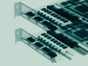 A series of computer parts stacked on top of each other in a greenish hue.