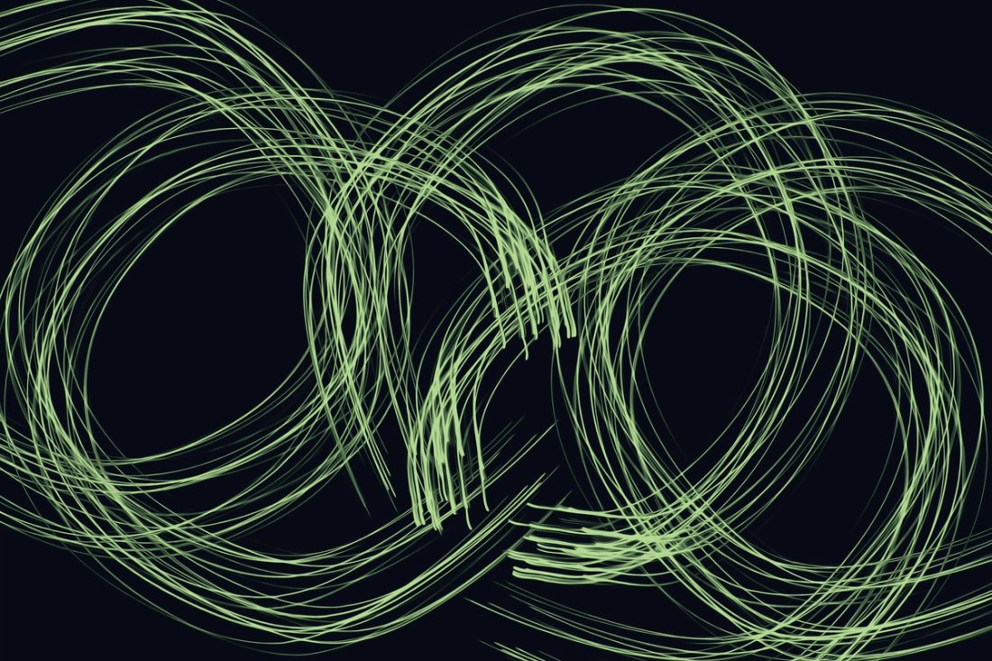 A series of concentric green circles on a black background.