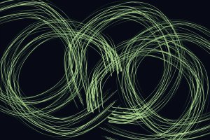 A series of concentric green circles on a black background.