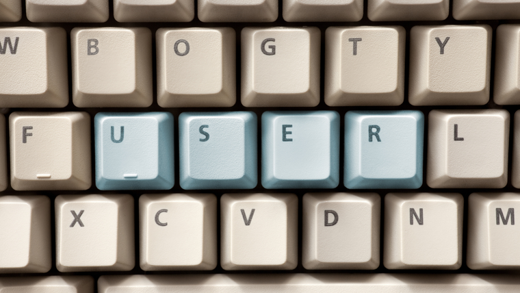Computer keyboard with highlighted buttons saying 