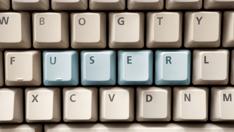 Computer keyboard with highlighted buttons saying