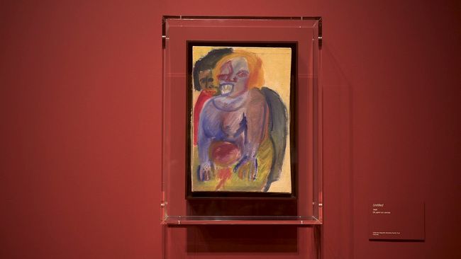 An early painting by Mendieta displayed on a red gallery wall