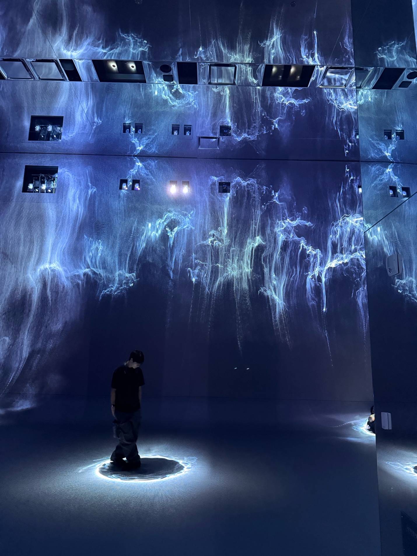 Blue immersive gallery inside Dataland’s Data Pavilion