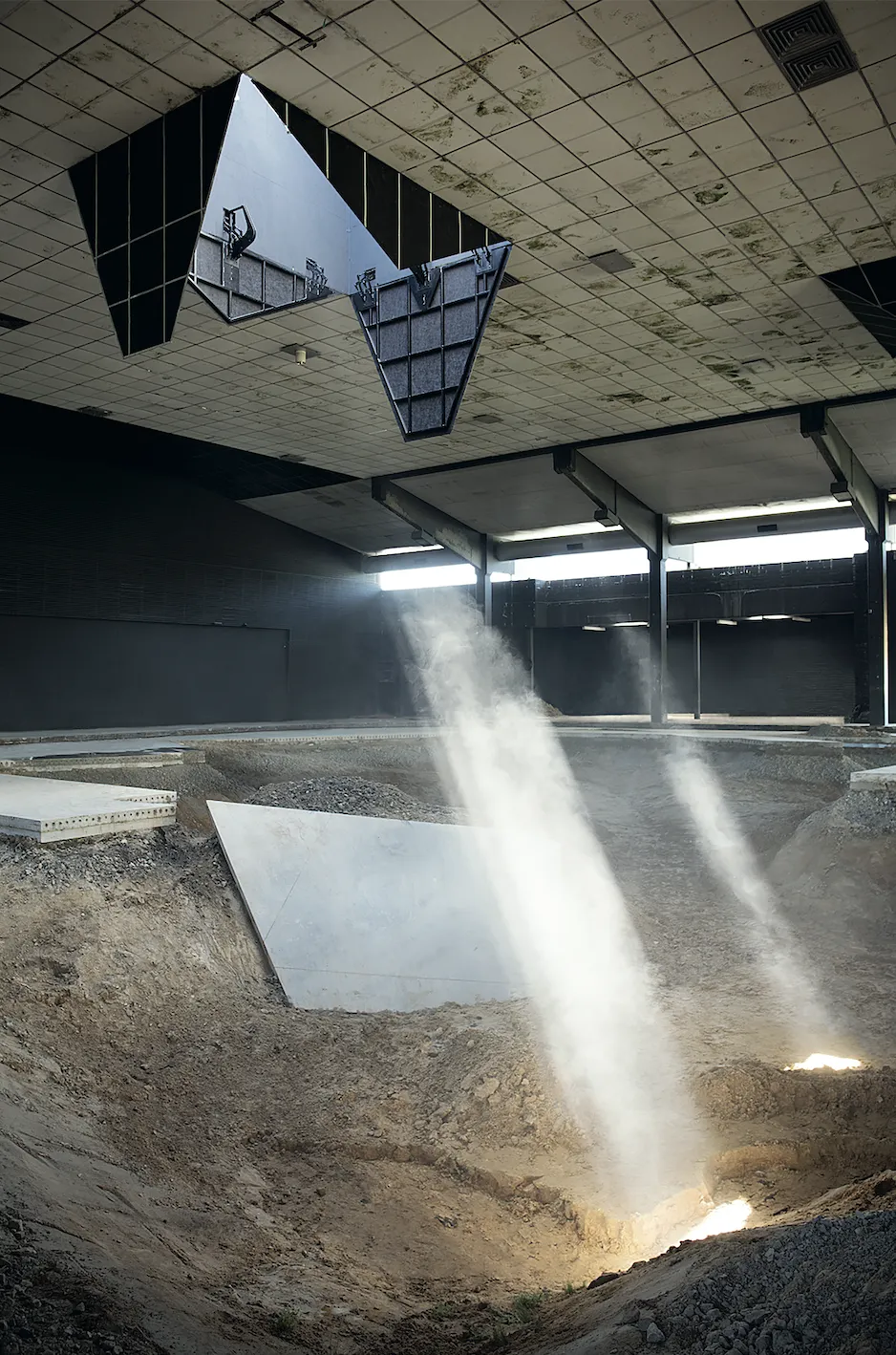 Sunlight through an automated skylight falling onto an aquarium in After ALife Ahead
