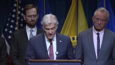 CMS Administrator Dr. Mehmet Oz speaks at a podium as officials stand behind him, October 14, 2026 (still from Rapid Response 47 video)