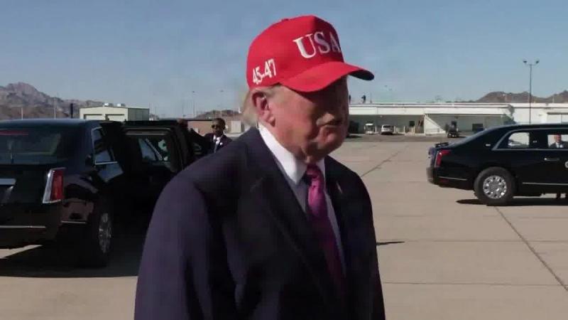President Trump, in a red USA 45-47 cap, on the tarmac before departing Bullhead City, Arizona, October 14, 2026 (still from Rapid Response 47 video)