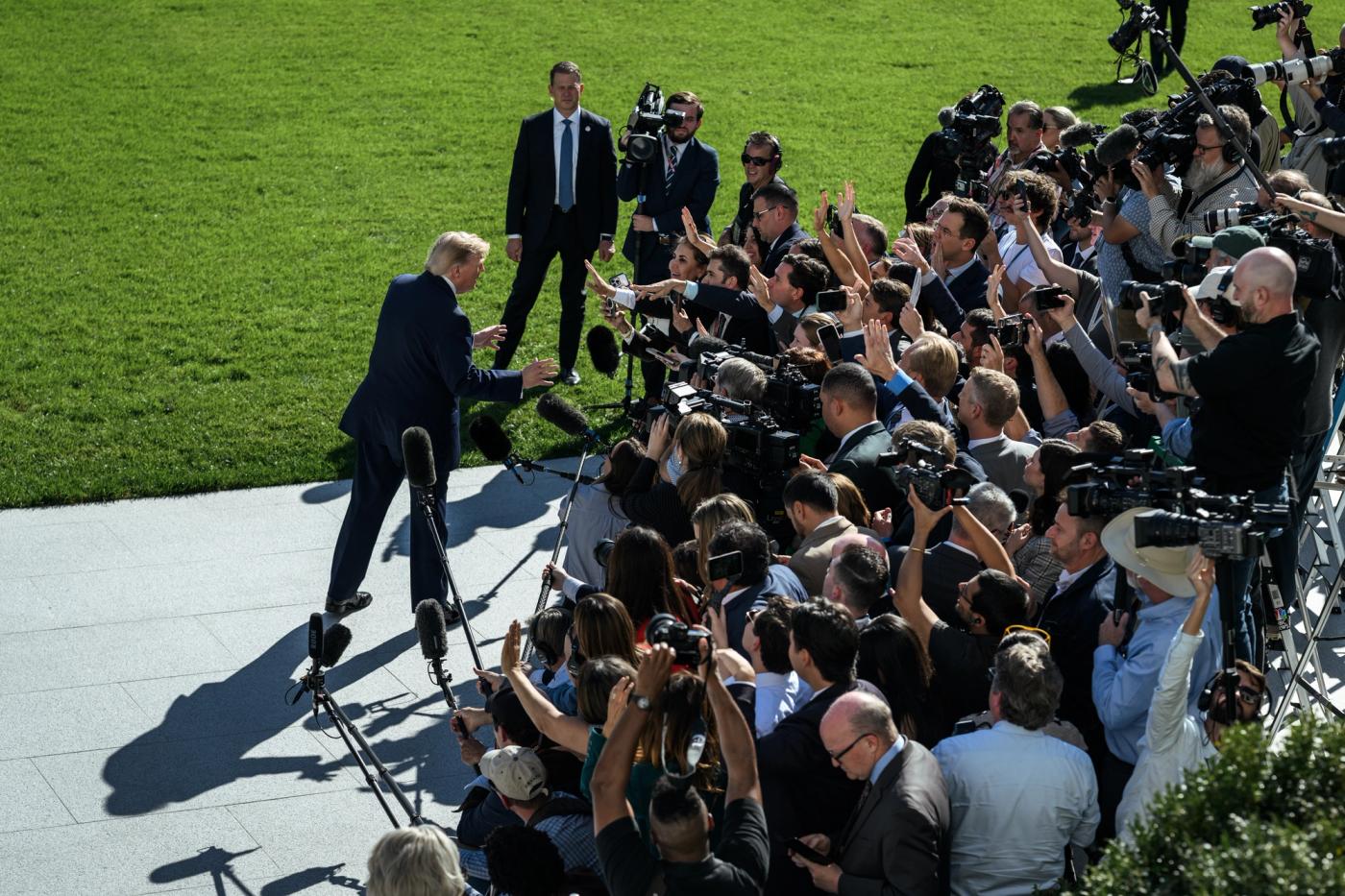 President Trump speaks with reporters on the South Lawn of the White House before departing for Grand Island, Nebraska, October 5, 2026 (Official White House Photo by Daniel Torok)