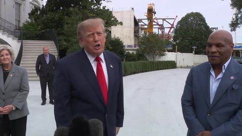President Trump speaks to reporters with Mike Tyson beside him as he departs the White House, October 9, 2026 (still from Official White House video)