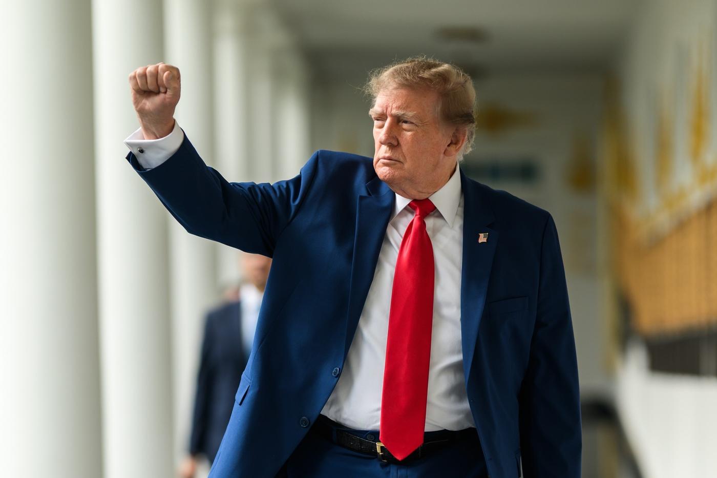 Stand-in photo (October 16, 2026): President Donald J. Trump raises his fist as he walks along the Colonnade of the White House, October 16, 2026 (Official White House Photo by Molly Riley / public domain)