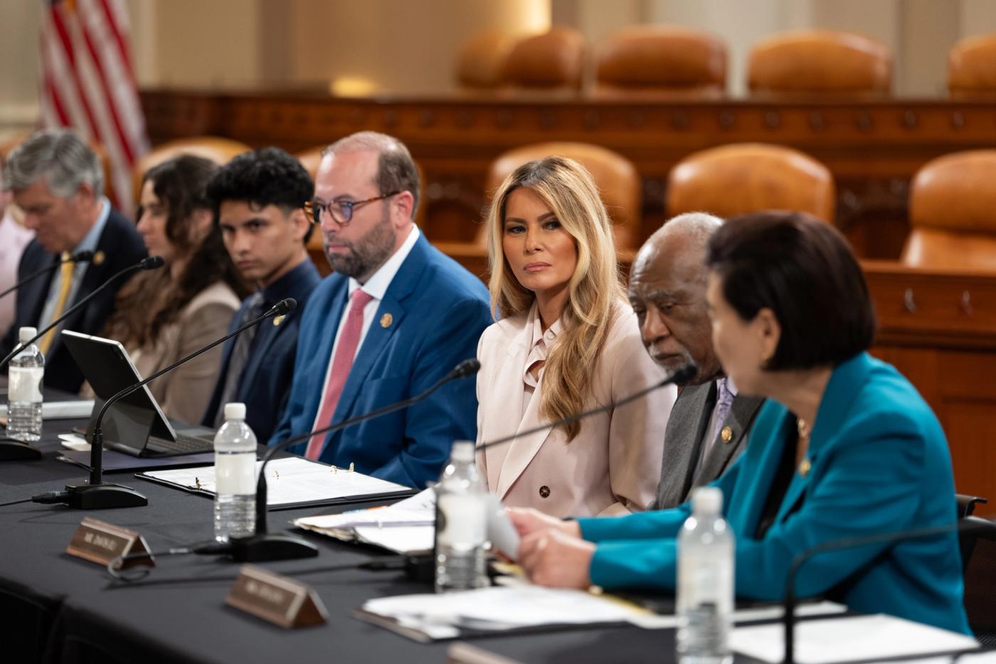 First Lady Melania Trump at a House Ways and Means foster-care roundtable, April 15, 2026 — Official White House Photo (F20260415AH-2893), interim until a Breast Cancer Awareness Month still posts