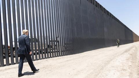 Stand-in photo (June 23, 2020): President Donald J. Trump walks along the completed 200th mile of new border wall Tuesday, June 23, 2020, along the U.S.-Mexico border near Yuma, Ariz. (Official White House Photo by Shealah Craighead)