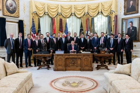 President Donald J. Trump at the Resolute Desk in the Oval Office with Vice President JD Vance and administration officials, October 20, 2026 (Official White House Photo by Joyce N. Boghosian / public domain)