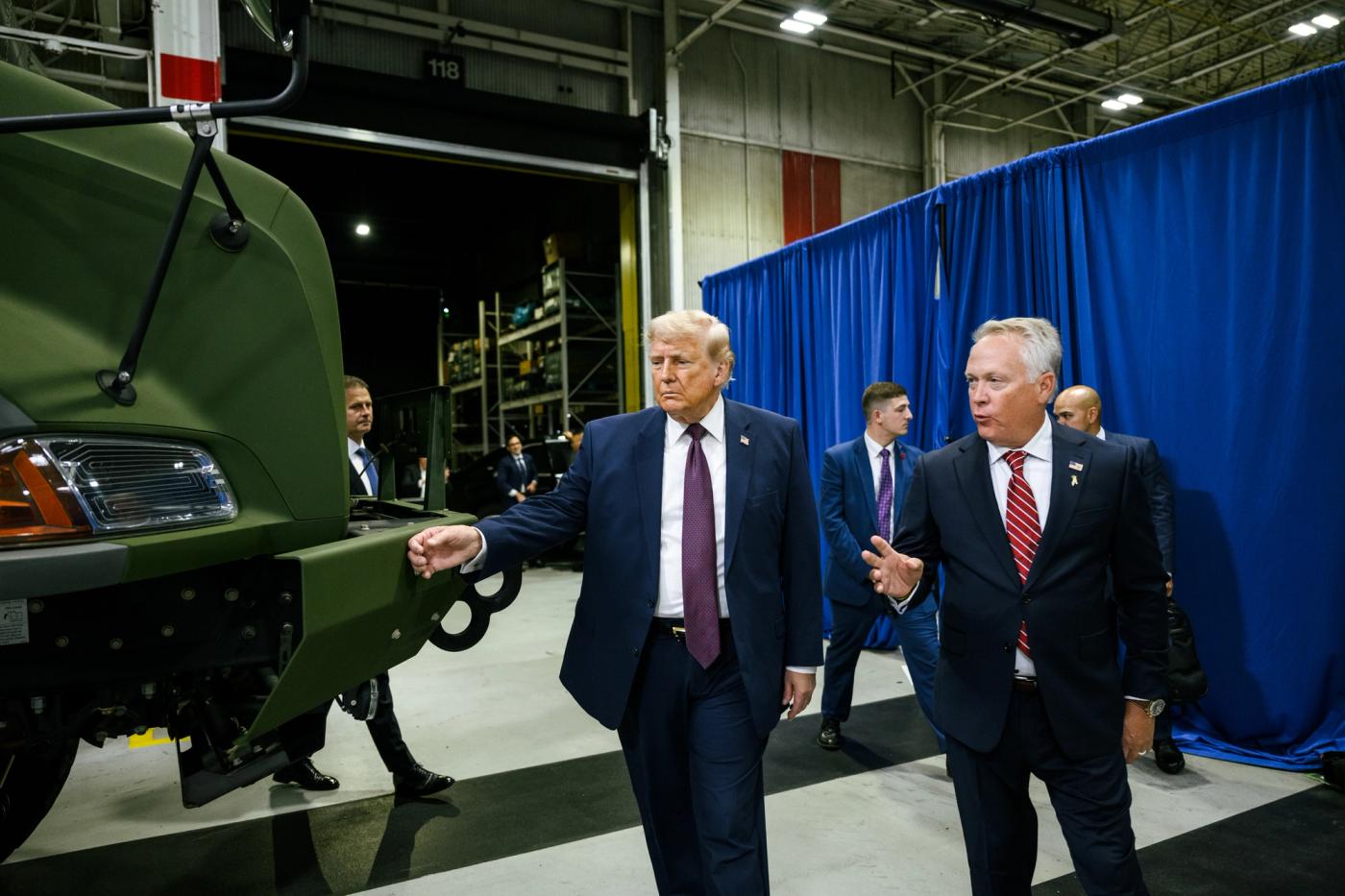 President Trump on the factory floor beside a heavy truck at the Mack Trucks facility in Pennsylvania, June 23, 2026 (Official White House photo)