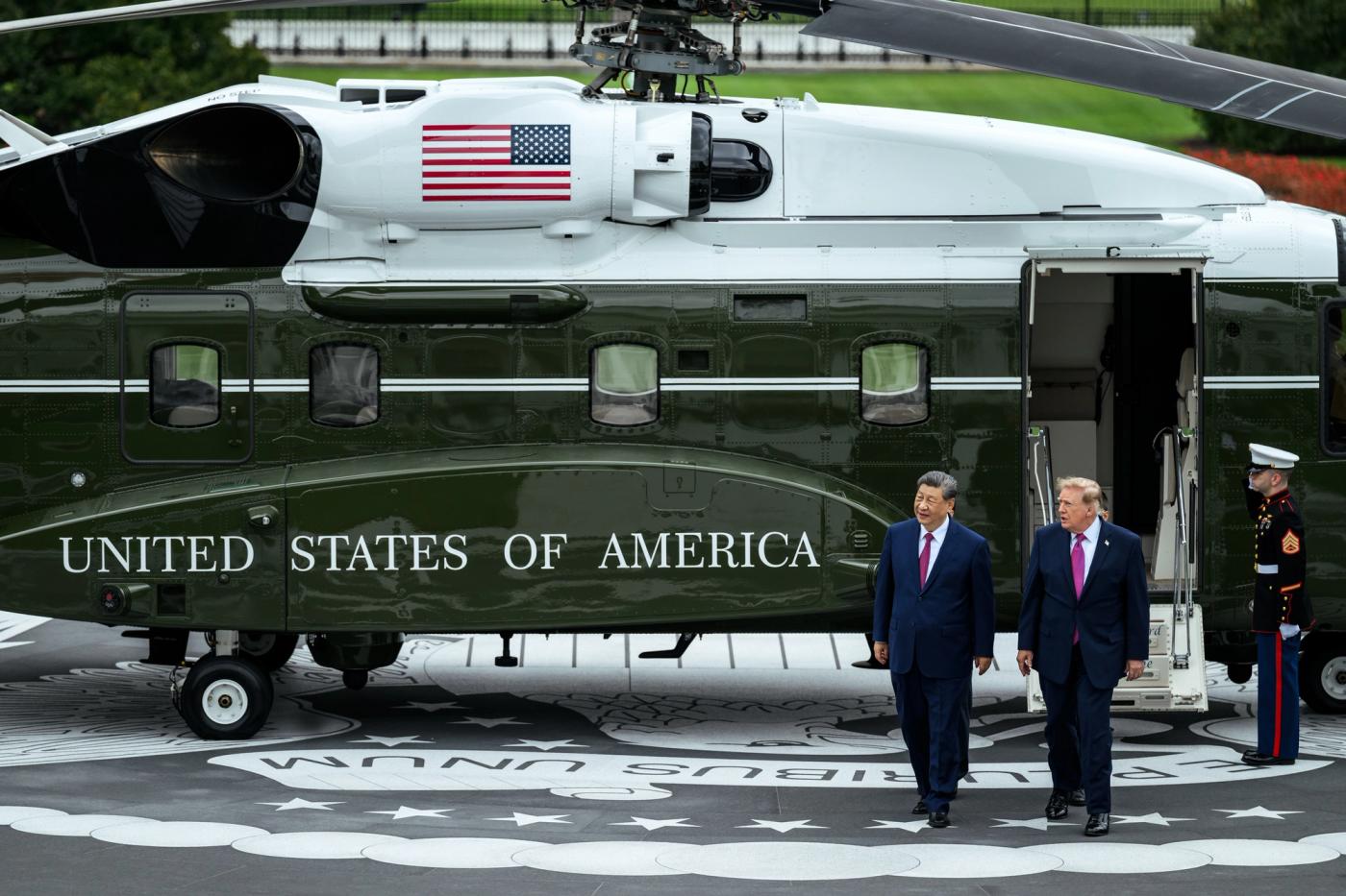 President Trump and President Xi Jinping walk past Marine One on the new White House South Lawn helipad during the China state visit, September 24, 2026 (Official White House photo)