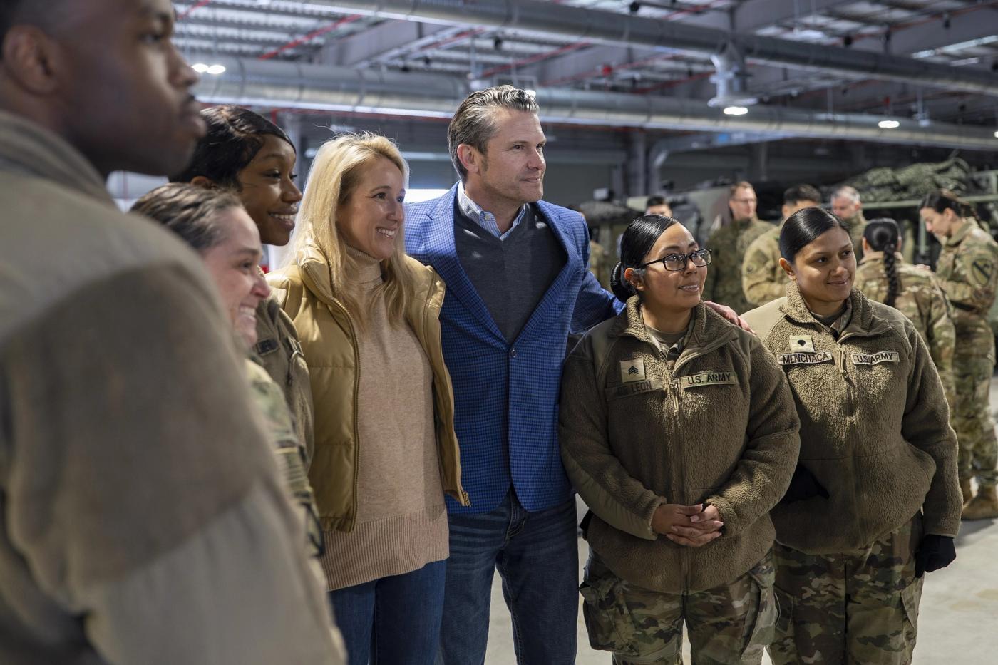 Stand-in photo (February 15, 2025): Then-Secretary of Defense Pete Hegseth and Jennifer Hegseth pose with soldiers of the 3rd Battalion, 10th Mountain Division in Powidz, Poland, February 15, 2025 (DoD photo by U.S. Navy Petty Officer 1st Class Alexander C. Kubitza / public domain)