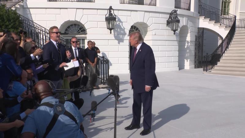 Interim: President Donald J. Trump speaks with the press on the South Lawn before departing the White House for Mobile, Alabama, Friday, October 2, 2026 (frame from the official White House video of the departure gaggle).