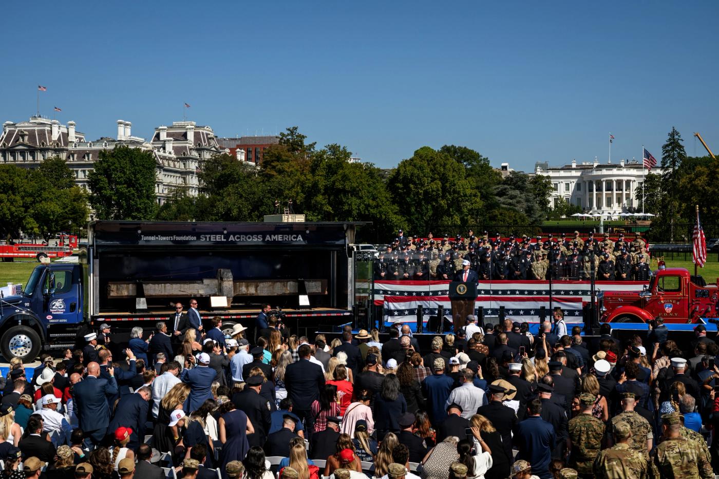 President Trump speaks at the Steel Across America event on the White House South Lawn beside a Tunnel to Towers steel beam display, September 8, 2026 (Official White House photo)