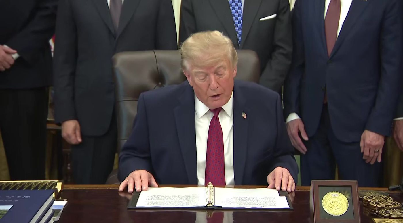 President Trump at the Resolute Desk during the Sep 30, 2026 Oval announcement, frame from The Patriot Oasis clip.