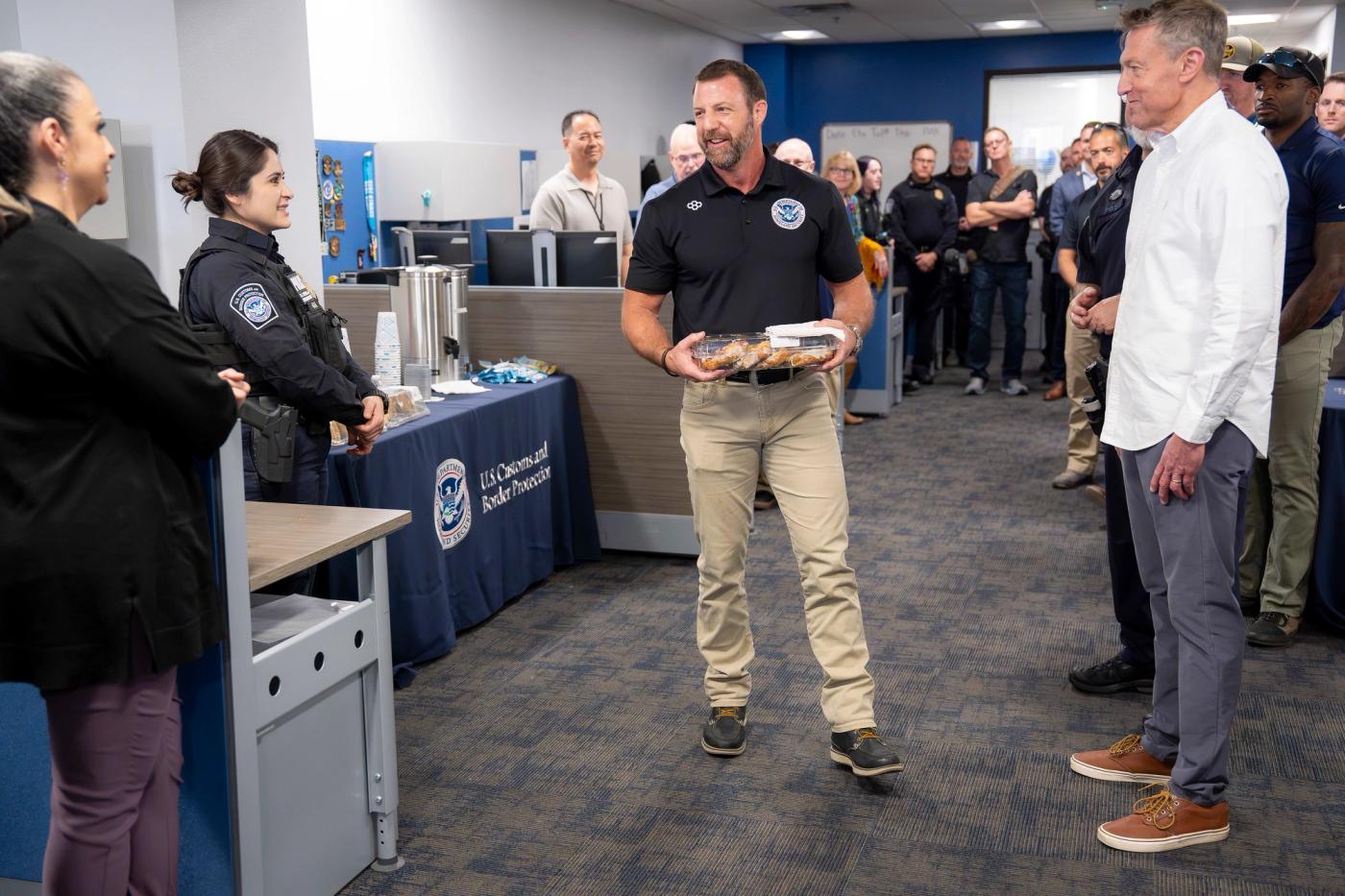 Secretary of Homeland Security Markwayne Mullin visits the U.S. Customs and Border Protection cargo facility with U.S. Customs and Border Protection Commissioner Rodney Scott in Phoenix, Arizona, Oct. 16, 2026. (DHS photo by Tia Dufour)