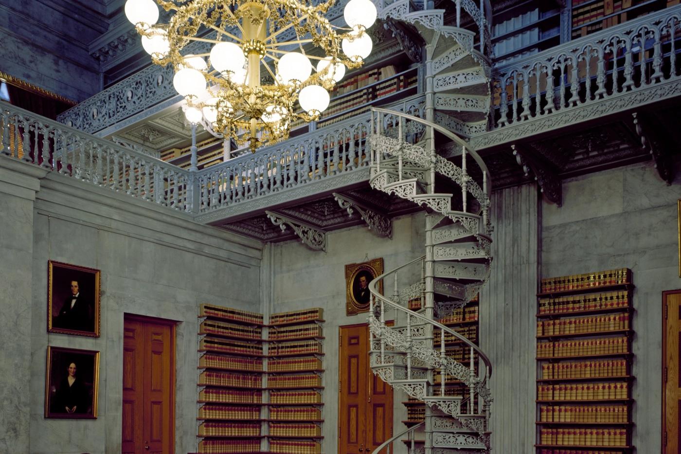 Stand-in photo (between 1980 and 2006): An ornamental cast-iron staircase is a feature in this room, which was once the Tennessee State Library, in the capitol in Nashville, Tennessee (Photo by Carol M. Highsmith, Library of Congress, public domain)