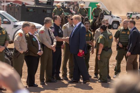 President Donald Trump visits a newly installed section of border wall near Calexico, California, April 5, 2019, with DHS and Border Patrol officials. U.S. Customs and Border Protection photo by Mani Albrecht (public domain).