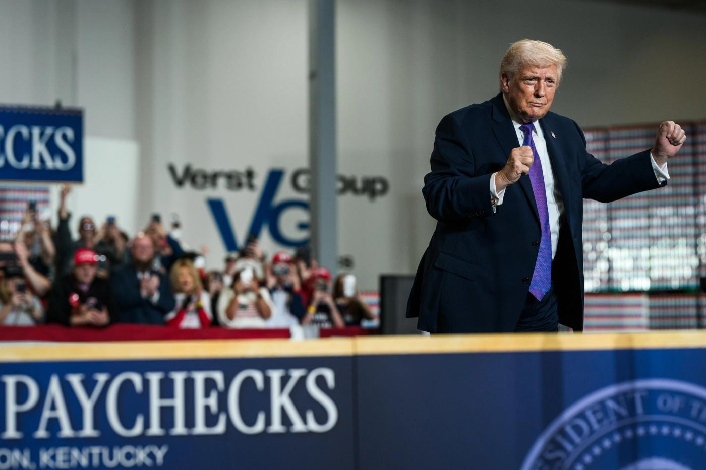 President Donald Trump speaks under a “Bigger Paychecks” banner at Verst Logistics Manufacturing in Hebron, Kentucky, March 11, 2026 (Official White House Photo / public domain)