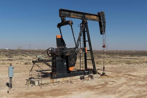 Oil infrastructure in the Permian Basin (Wikimedia Commons, CC BY-SA) — economic pressure campaign tightening on Iran.