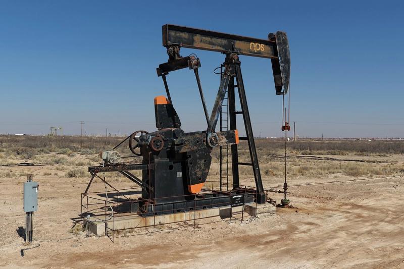 Oil infrastructure in the Permian Basin (Wikimedia Commons, CC BY-SA) — economic pressure campaign tightening on Iran.