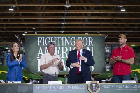 President Donald J. Trump stands with farmers at a roundtable in support of Wisconsin farmers at Custer Farms in Eau Claire, Wisconsin, June 5, 2026 (Official White House Photo by Joyce N. Boghosian / public domain)