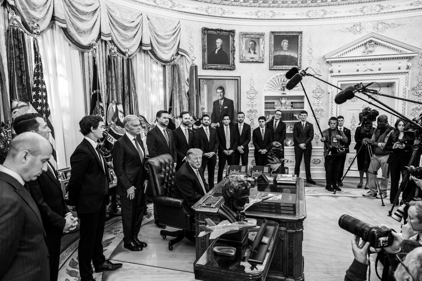 President Donald J. Trump in the Oval Office surrounded by administration officials and members of the press, October 20, 2026 (Official White House Photo by Joyce N. Boghosian / public domain)