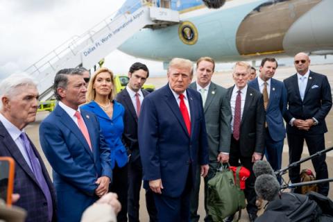 Interim: President Donald J. Trump disembarks Air Force One with members of Congress and speaks to the press at Dallas Fort Worth International Airport, Texas, Thursday, October 1, 2026. (Official White House Photo by Molly Riley, P202601001MR-1383)