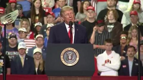 President Donald J. Trump speaks at a podium bearing the presidential seal at his rally in Youngstown, Ohio, October 12, 2026. (Video still, @RapidResponse47)