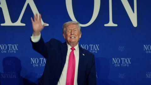 President Trump smiles and waves in front of a No Tax on Tips backdrop reading Las Vegas, Nevada, a scene from the White House video “No Tax on Overtime: Promises Made, Promises Kept,” released October 11, 2026
