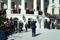 President Trump waves to guests on the Truman Balcony before boarding Marine One on the South Lawn of the White House en route to Sparrows Point, Maryland, October 6, 2026 (Official White House Photo by Molly Riley)