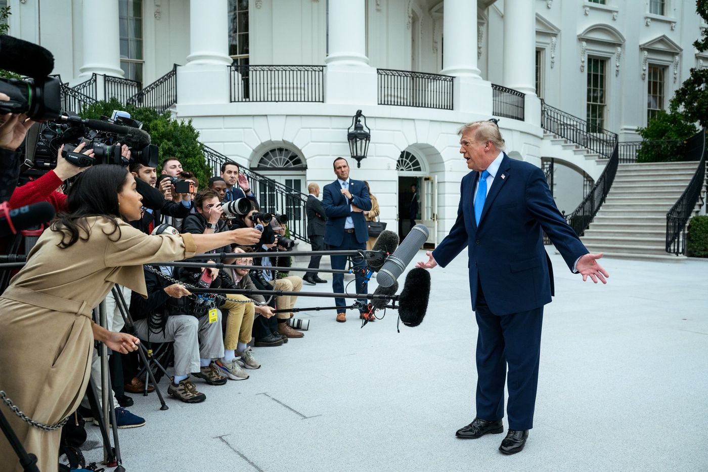 President Trump speaks with members of the media on the South Lawn before departing on his midterm barnstorm, October 3, 2026 (Official White House Photo by Joyce N. Boghosian)