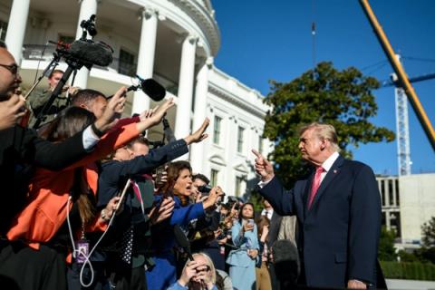 Stand-in photo (October 19, 2026): President Donald J. Trump speaks with members of the media on the South Lawn before departing on Marine One, October 19, 2026 (Official White House Photo by Joyce N. Boghosian / public domain)