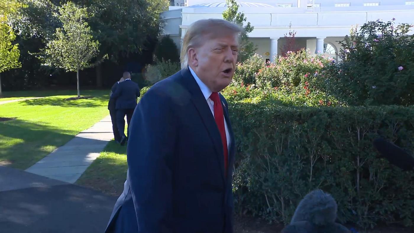 President Donald J. Trump speaks to reporters on the South Lawn of the White House before departing for South Carolina, October 21, 2026 (still from official White House video / public domain)