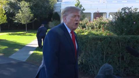 President Donald J. Trump speaks to reporters on the South Lawn of the White House before departing for South Carolina, October 21, 2026 (still from official White House video / public domain)