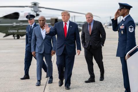 Stand-in photo (October 9, 2026): President Donald J. Trump disembarks Marine One at Joint Base Andrews, Maryland on Friday, October 9, 2026, and boards Air Force One en route Syracuse Hancock International Airport in Syracuse, New York. (Official White House Photo by Molly Riley)