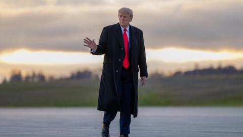 President Donald J. Trump disembarks Marine One and boards Air Force One at Joint Base Elmendorf-Richardson in Anchorage, Alaska, Tuesday, October 13, 2026, en route Harry Reid International Airport in Las Vegas, Nevada. (Official White House Photo by Molly Riley)