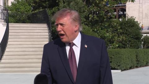 Interim: President Donald J. Trump speaks with the press on the South Lawn before departing the White House for Mobile, Alabama, Friday, October 2, 2026 (frame from the official White House video of the departure gaggle). No Mitchell Center photo has been posted.