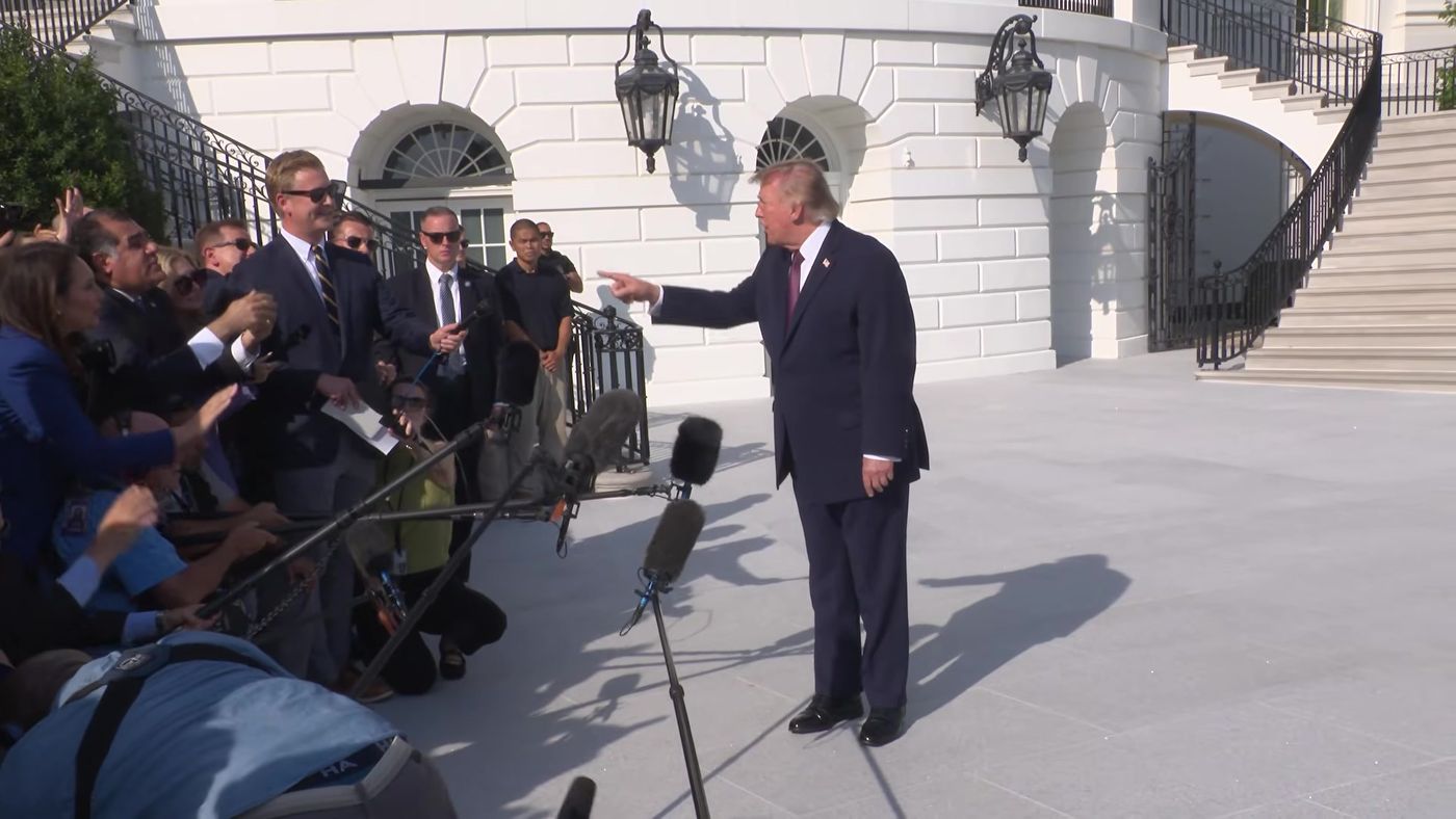 President Donald J. Trump takes questions from the press on the South Lawn before departing the White House, Friday, October 2, 2026 (frame from the official White House video of the departure gaggle).