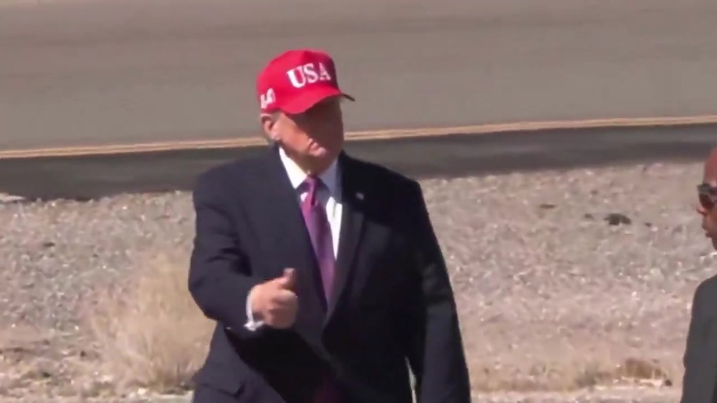 President Trump, in a red USA cap, gives a thumbs-up after arriving in Bullhead City, Arizona, October 14, 2026 (still from Rapid Response 47 video)