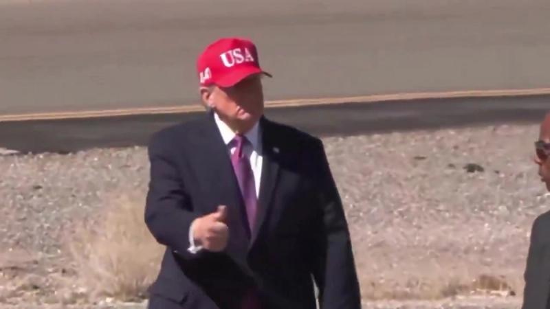 President Trump, in a red USA cap, gives a thumbs-up after arriving in Bullhead City, Arizona, October 14, 2026 (still from Rapid Response 47 video)