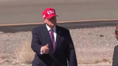 President Trump, in a red USA cap, gives a thumbs-up after arriving in Bullhead City, Arizona, October 14, 2026 (still from Rapid Response 47 video)